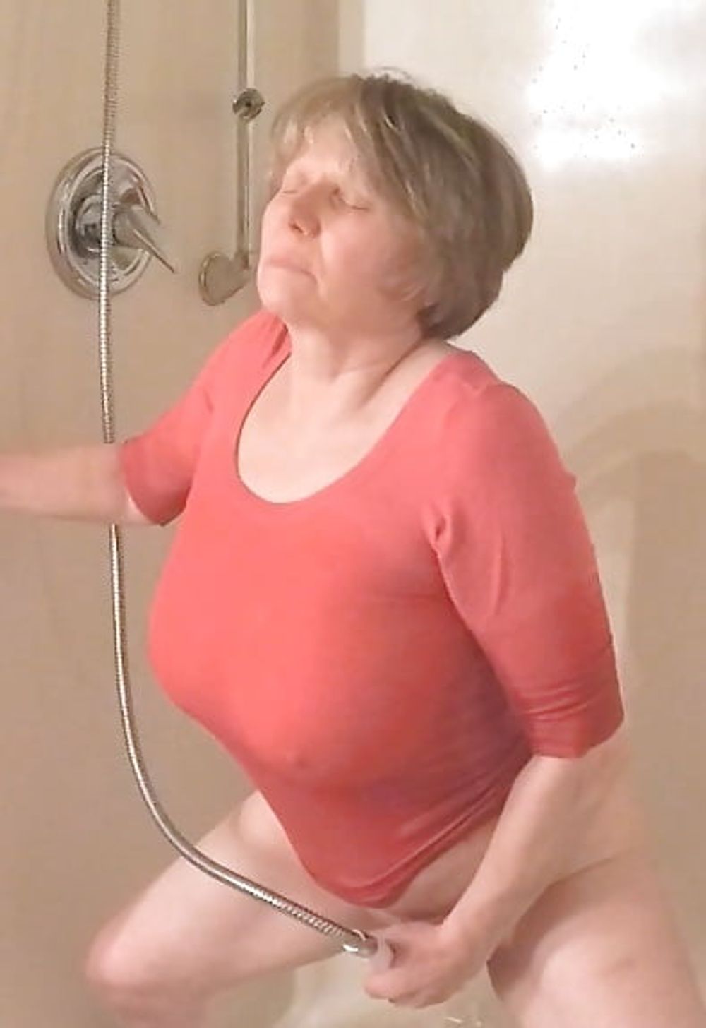 GILF masturbates in wet t-shirt #18