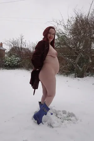 pregnant flashing naked in the cold snow         