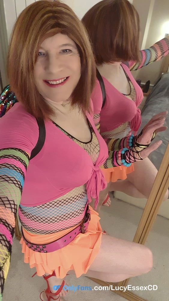Big cock Sissy Lucy wanking in colour clash outfit