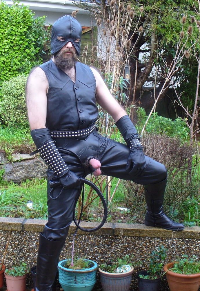 Leather Master in cock harness, boots and hood #14