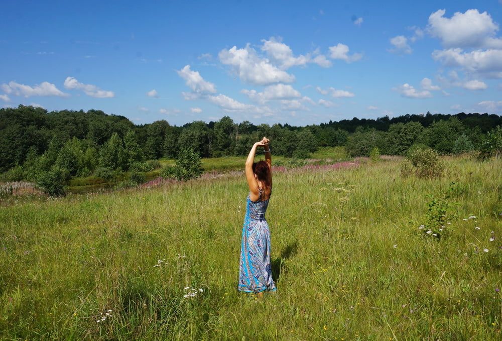 In blue dress in field #19