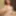 Redhead cutie shows off outfits and gets nude