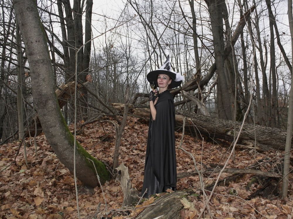 Witch with broom in forest #13