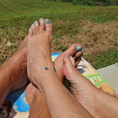 Relaxing outside getting a tan on our feet