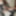 gekleidet in sexy femwear, make-up und auburn haaren