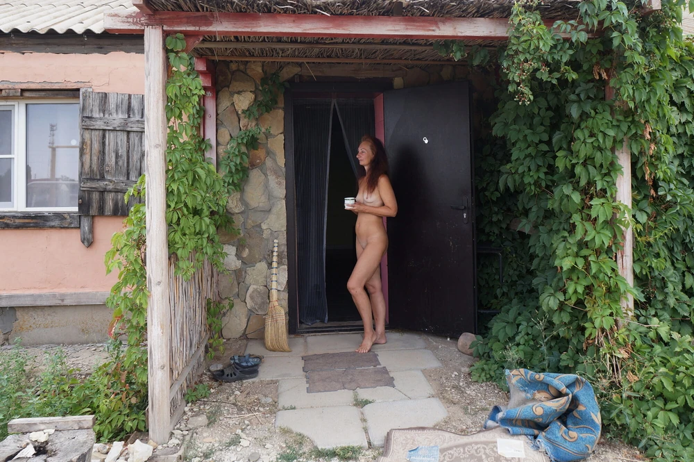 Nude on porch #20