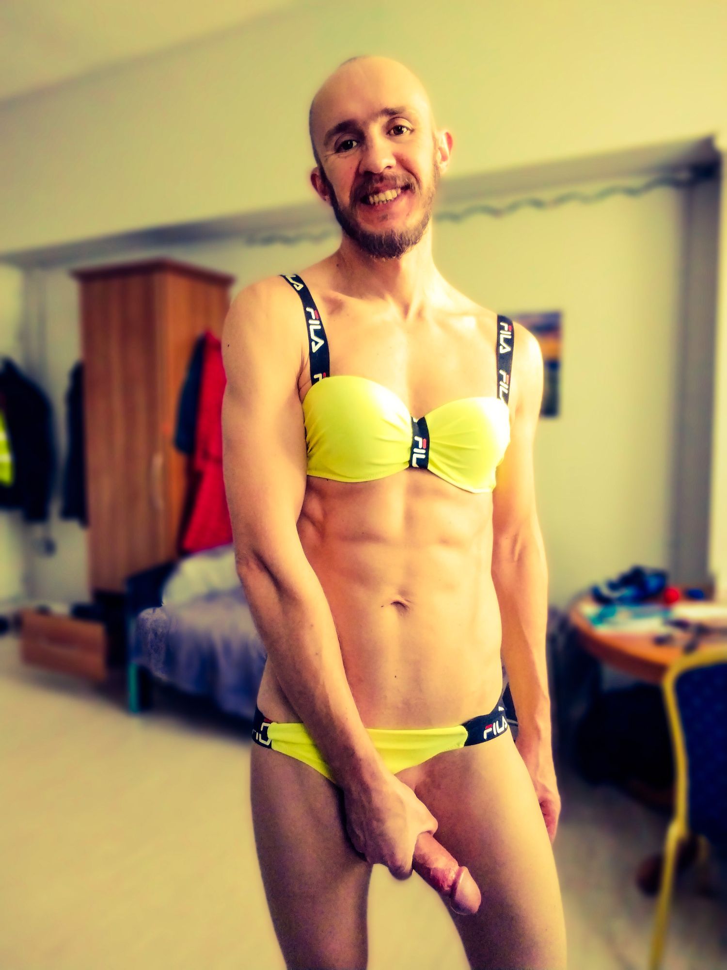 Bearded athletic man posing in yellow swimsuit  #17
