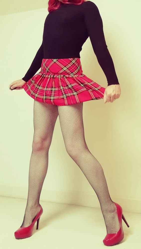 Marie crossdresser in fishnet pantyhose and tartan skirt #39