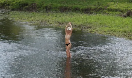 nude in rivers water         