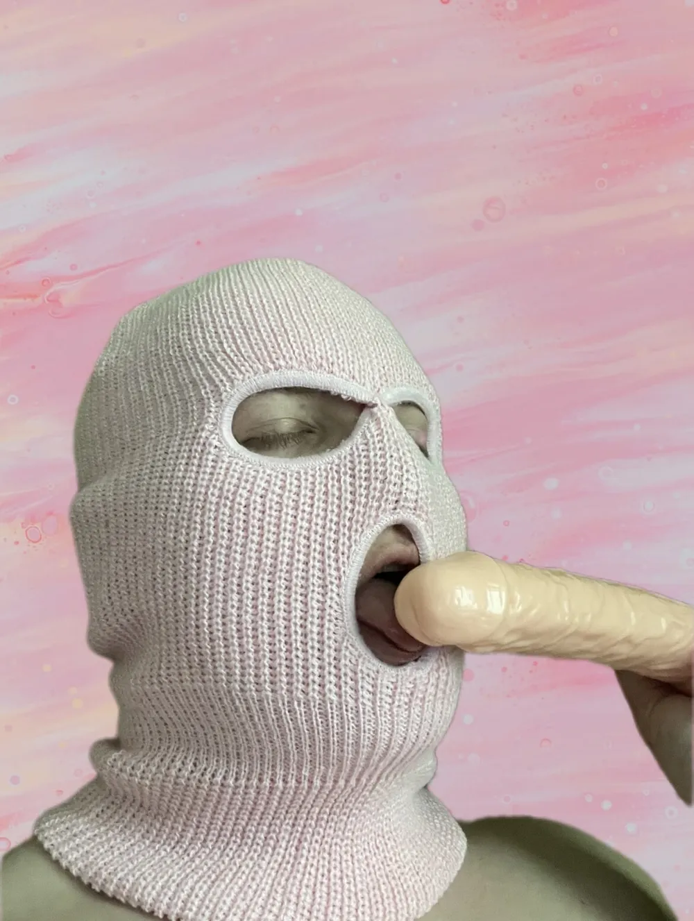 Playing with a dildo in a pink mask #2