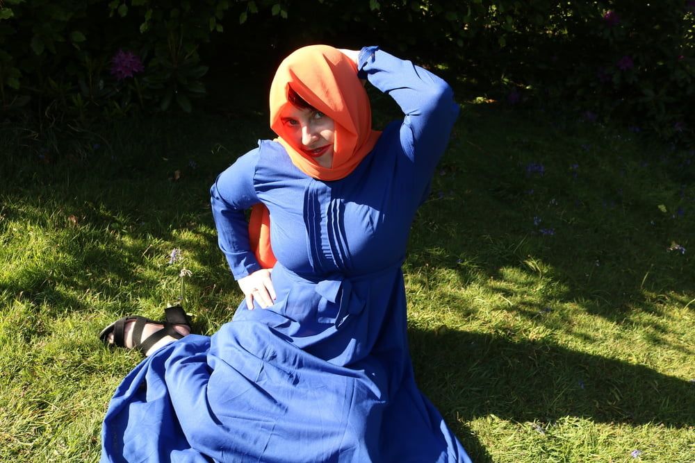 hijab and abaya flashing outdoors #9