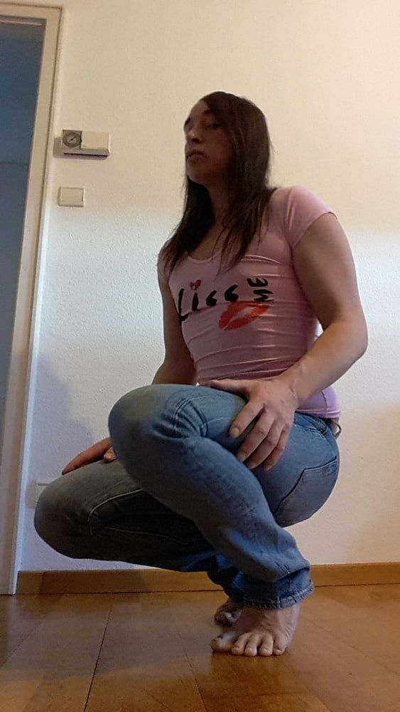 Tygra undresses and shows off her big t girl cock. #15