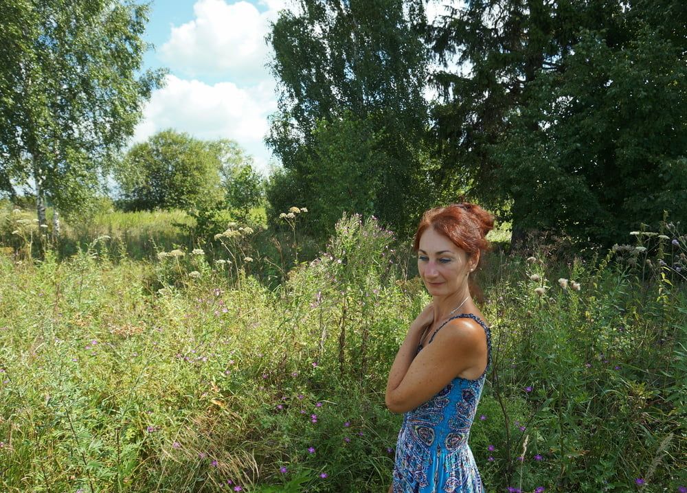 In blue dress in field #10