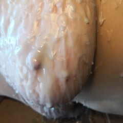 Breasts in hot wax