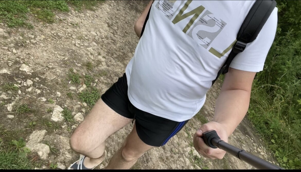 A photo of a naked walk in the summer forest #15