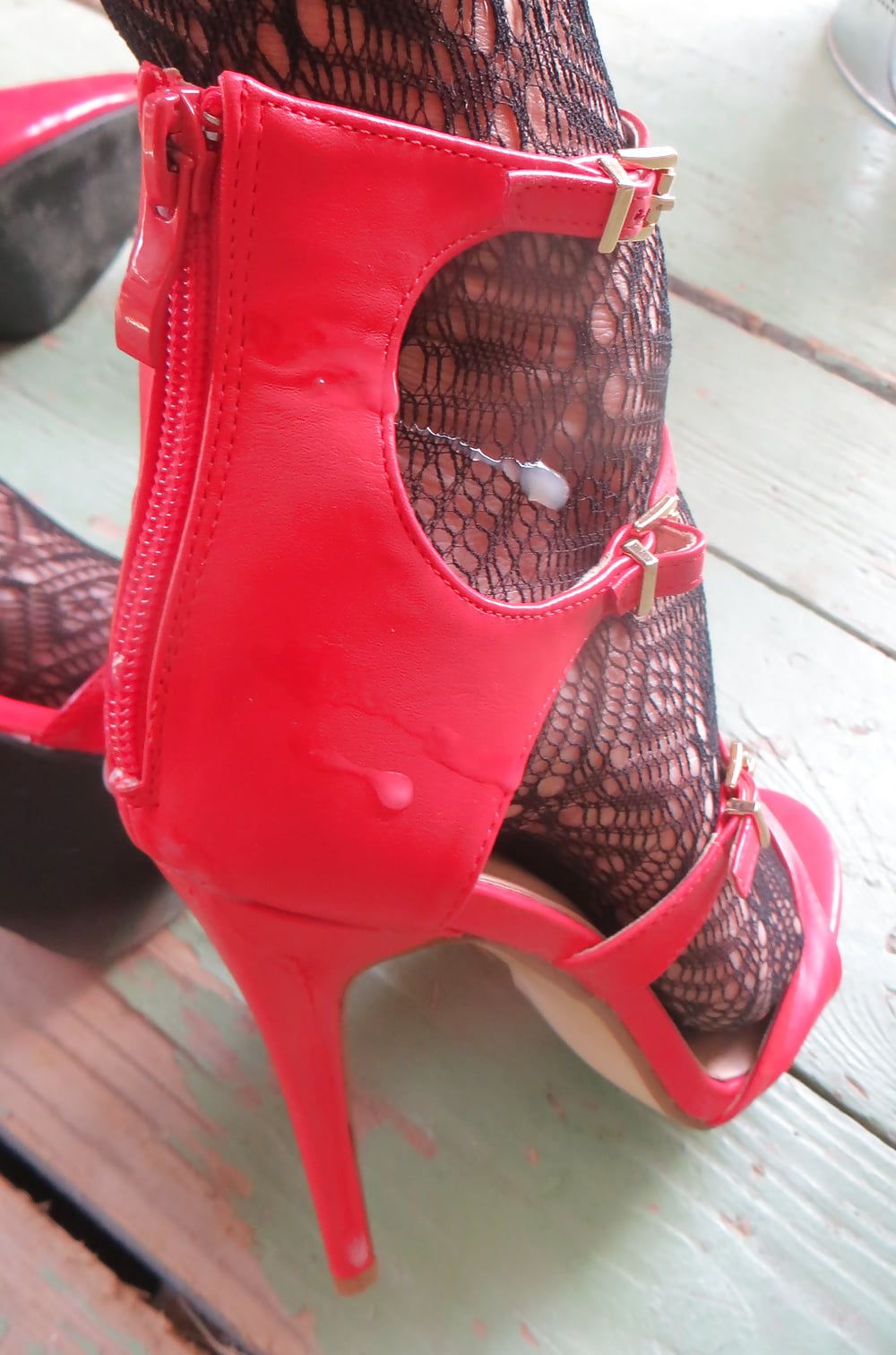 cummed red zipper of her ankle strap heels #6