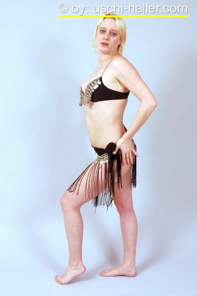 Photo shoot with blonde cum slut Dany Sun as a belly dancer #6