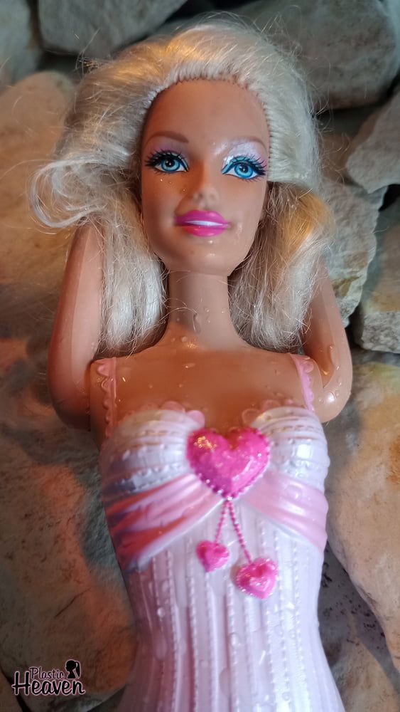 Barbie sunbathes after swimming in the ocean #3