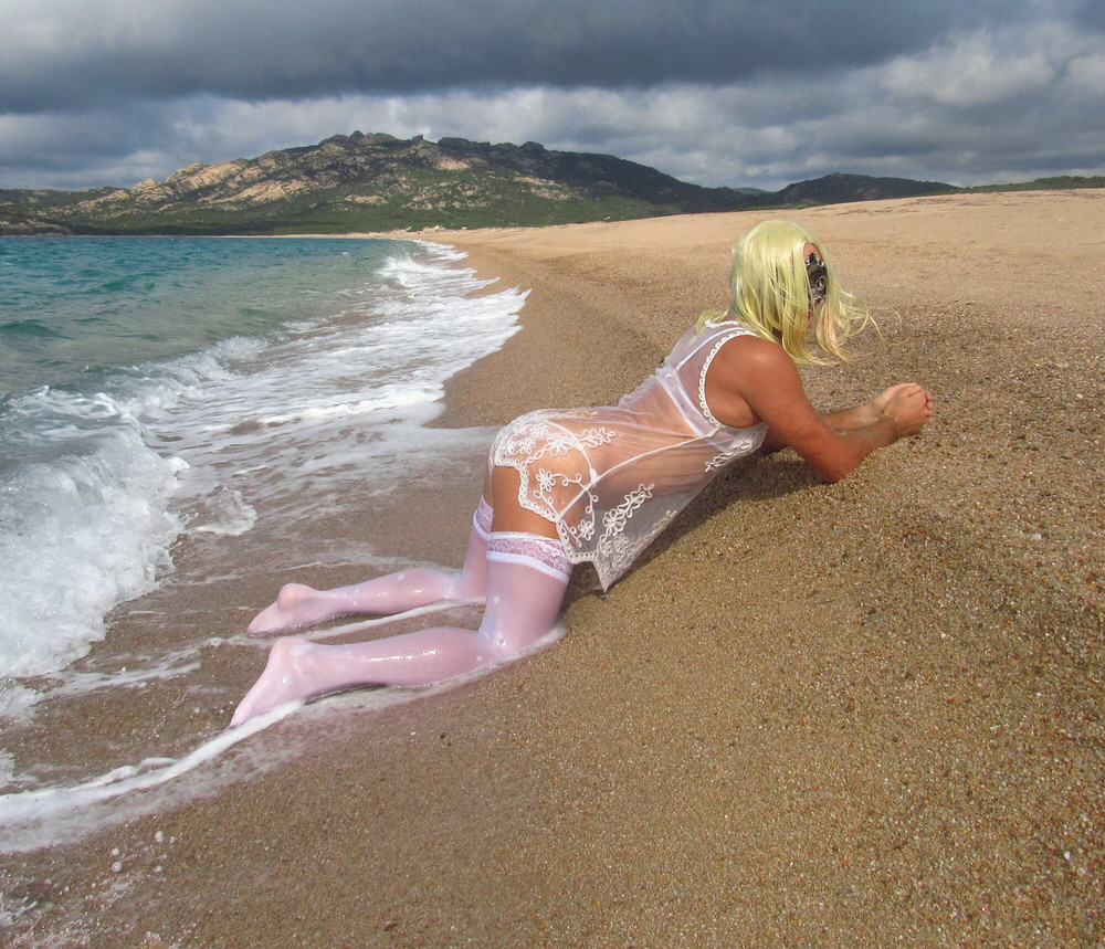 Sexy MILF Blonde shows off her ass on the beach. #31