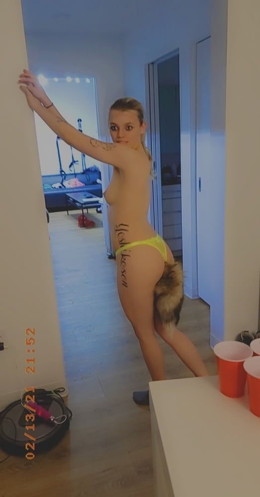 Hot Blonde with a Furry Butt Plug 