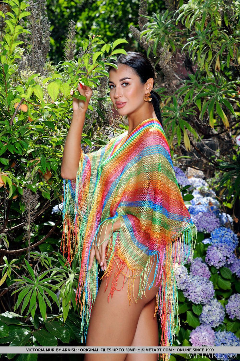 Beauty Victoria Mur wears nothing but a bright poncho #2