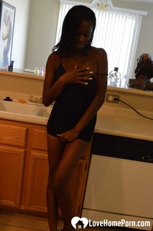 ebony woman shows off both sides of her         