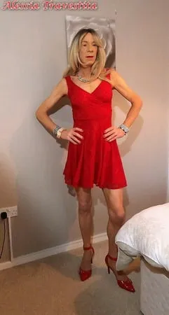    alessia travestita in flirty red dress         