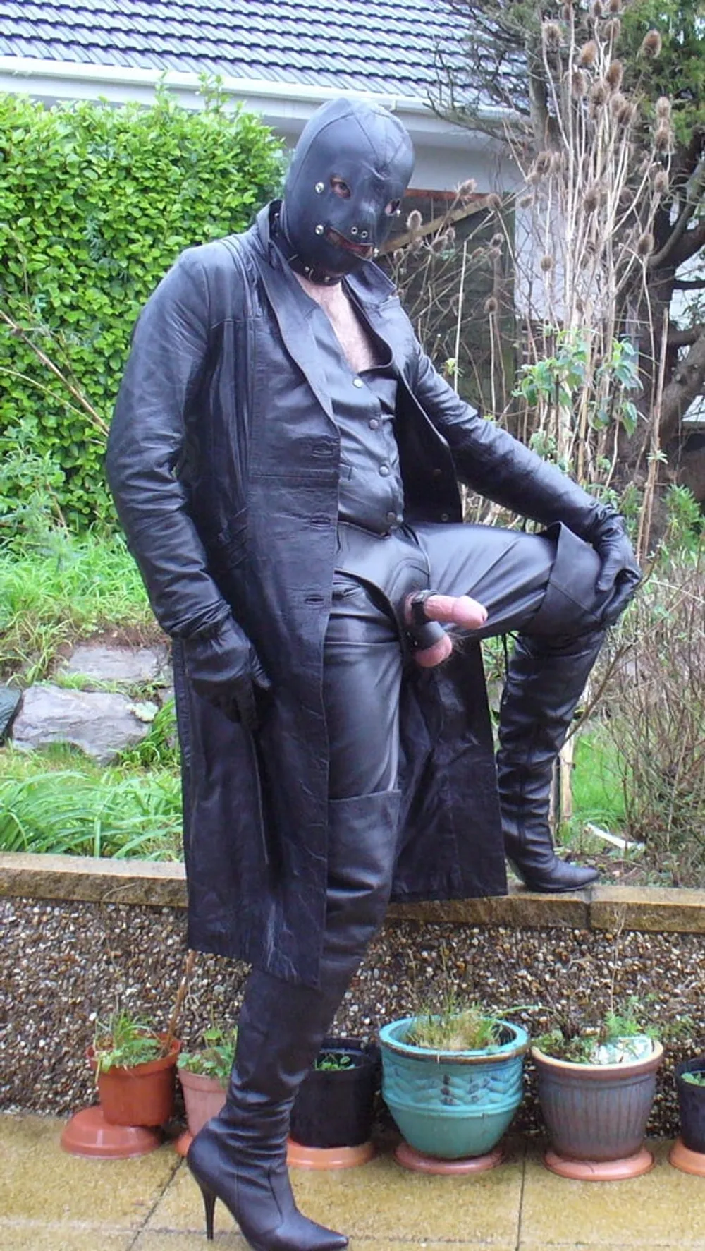 Leather Master in cock harness, boots and hood #3