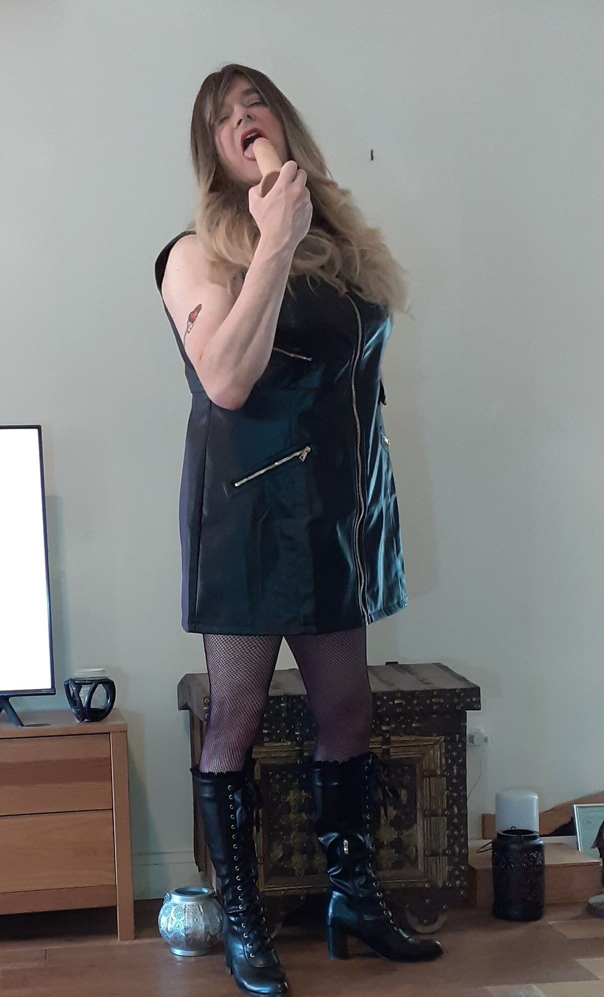 crossdressed in black leather dress #42