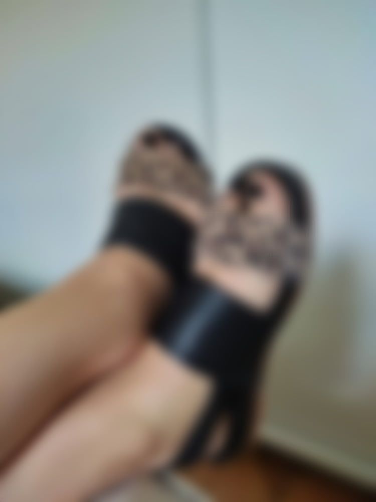 My feet with black sandals