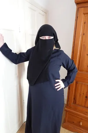 pale skin milf in burqa and niqab and high heels         