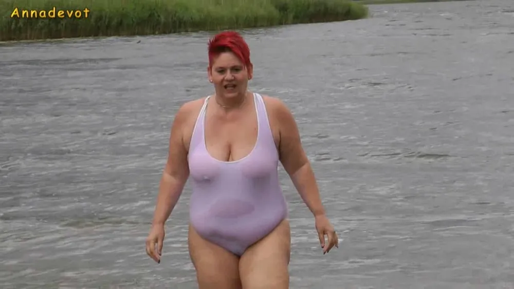 In WHITE SWIMSUIT in the lake