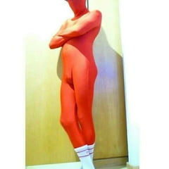 Fun At Home Wearing a Red Zentai Costume