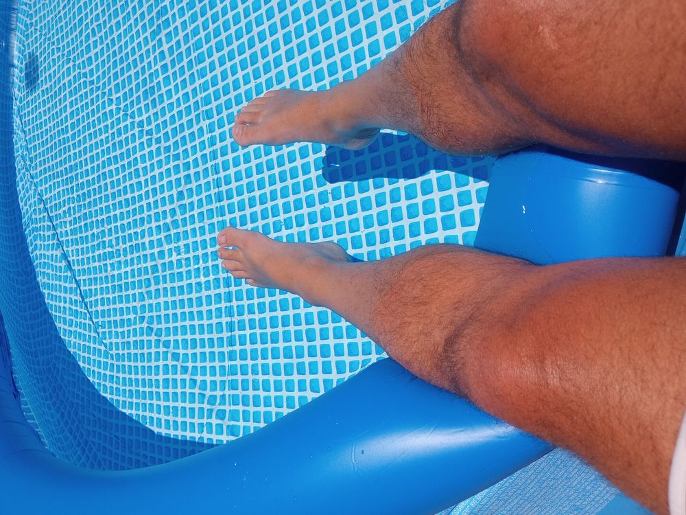 My bare feet and hairy legs getting a tan #11