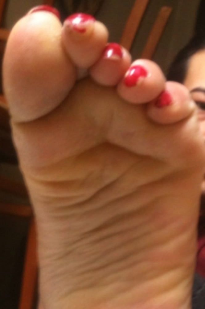 used red toenails, and soles feet after day at beach #32