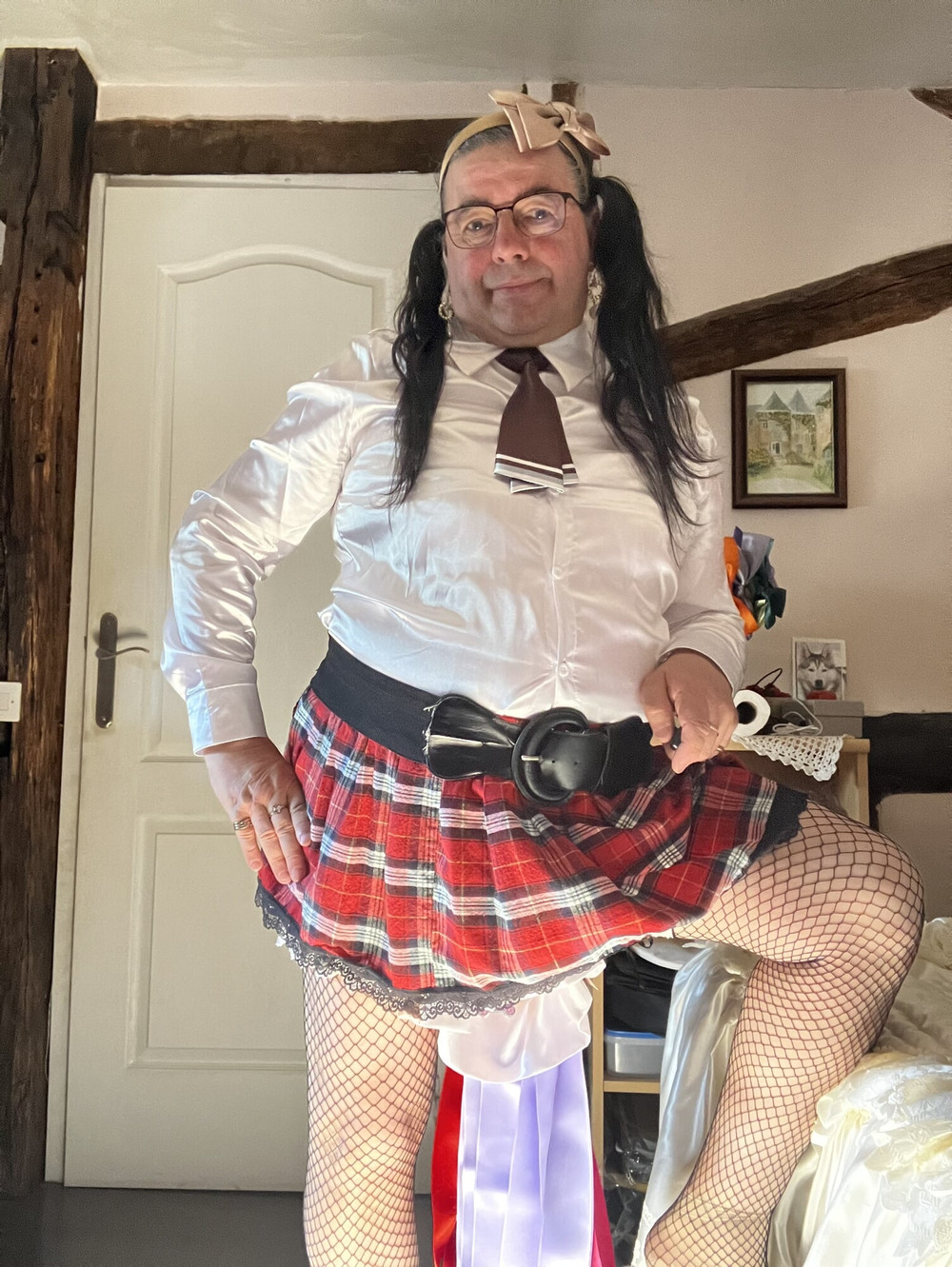 In an outfit with a little red and black skirt #8