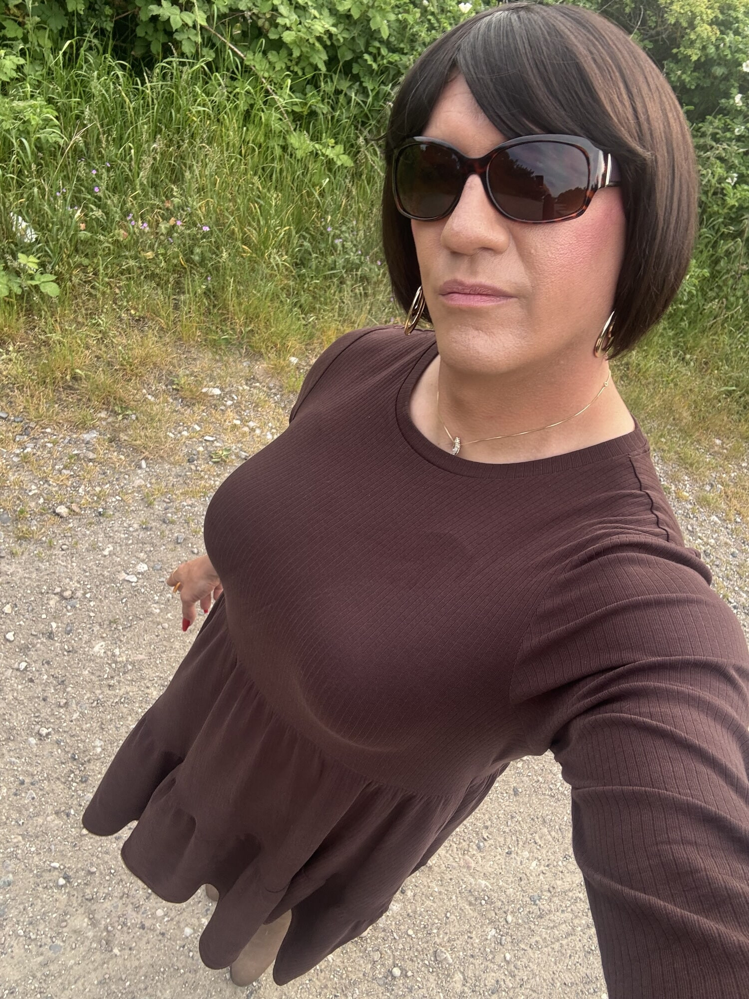 Out in brown dress 