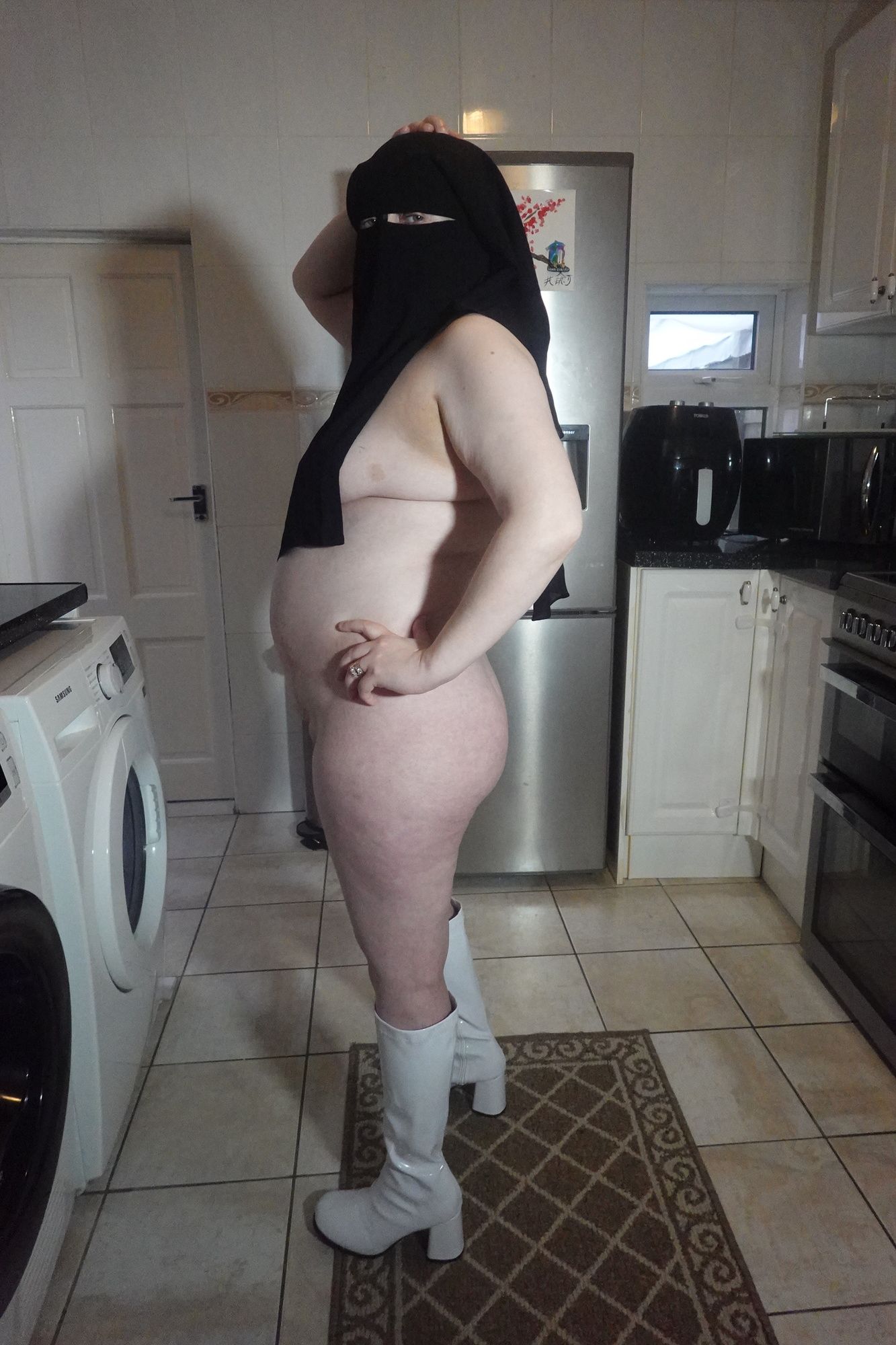 Naked in Niqab and white Knee Boots #9