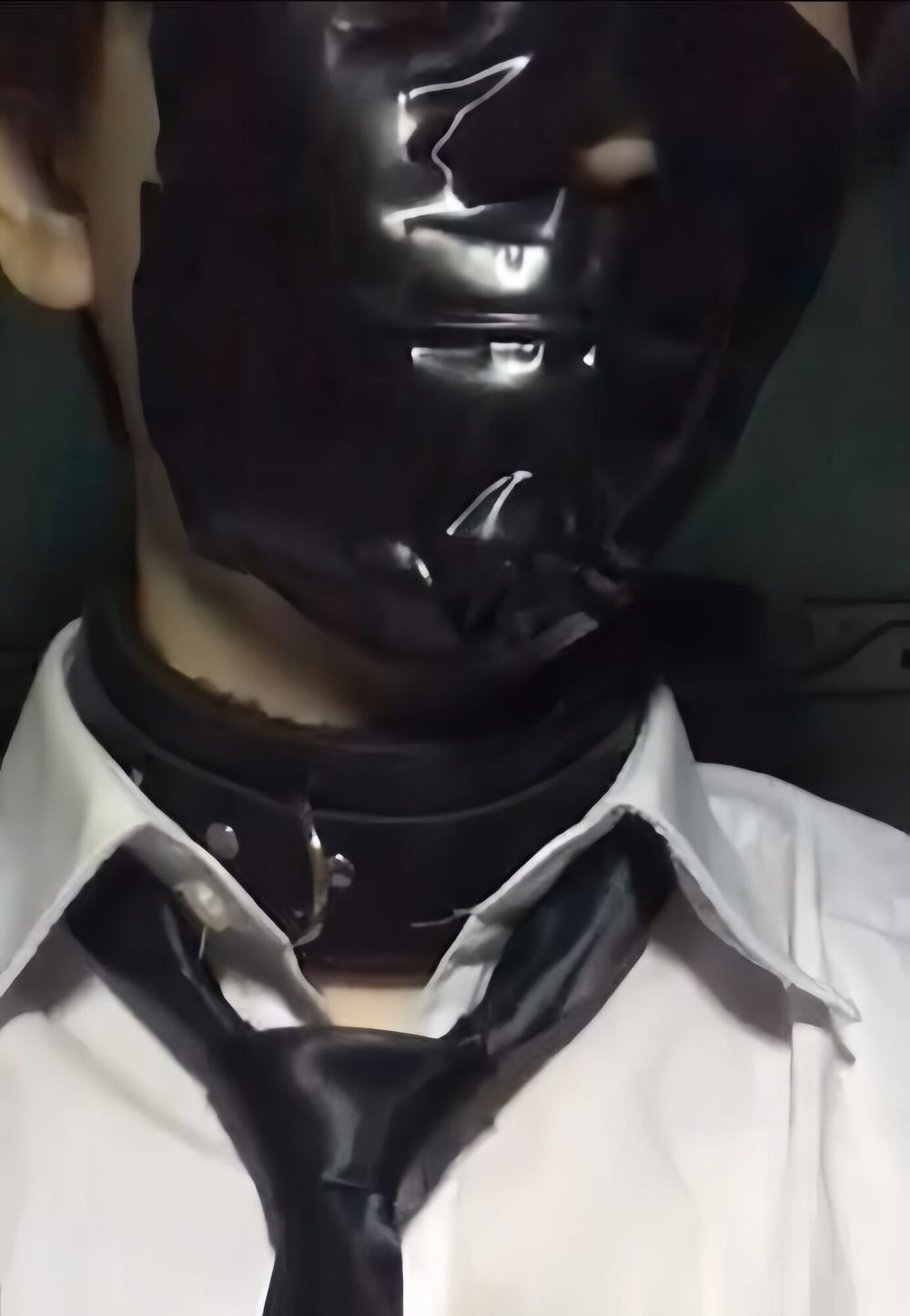 Wearing a white shirt and shiny black tie, gagged with duct  #24