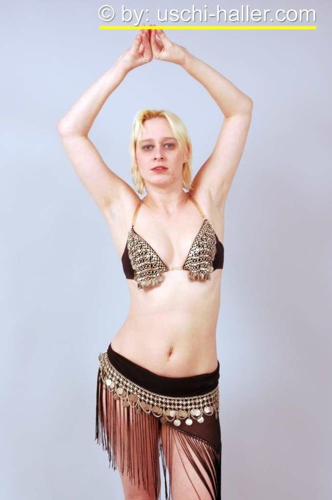 Photo shoot with blonde cum slut Dany Sun as a belly dancer #13