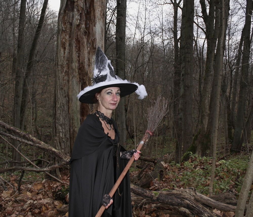 Witch with broom in forest #30