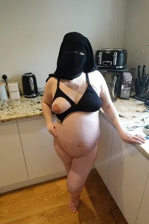 pregnant wife in muslim niqab and nursing bra         