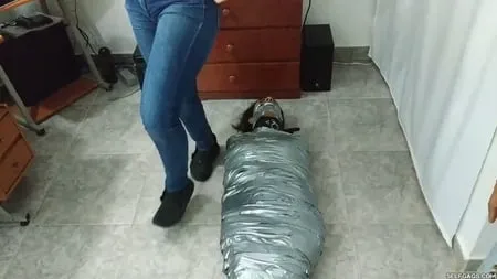 heavily duct tape mummified by crazy bondage women         