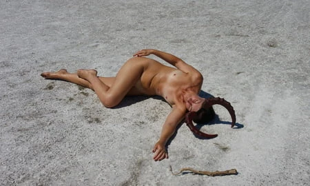 lying naked on the salt of the saltlake elton russia         