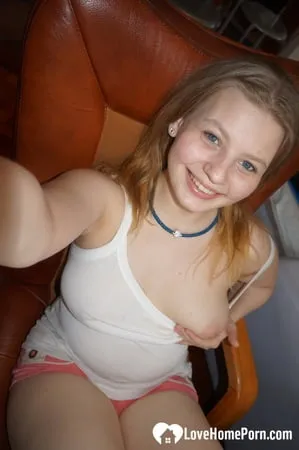 Busty girlfriend exposes her tits to the camera         