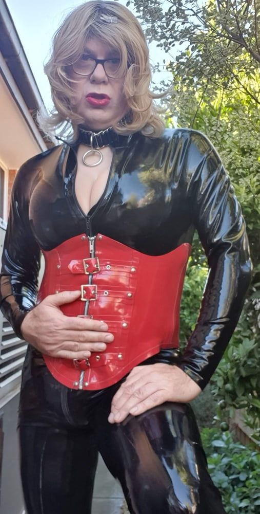 Rachel Wears a Catsuit and a Red Corset #9