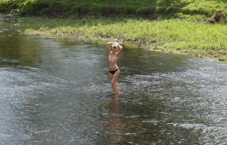 nude in rivers water         