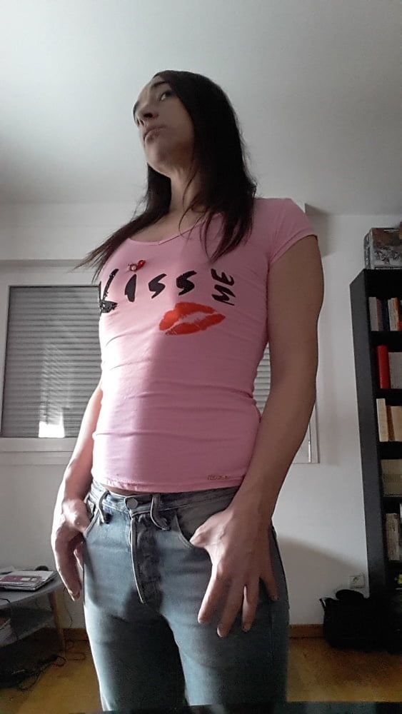 Tygra undresses and shows off her big t girl cock. #2