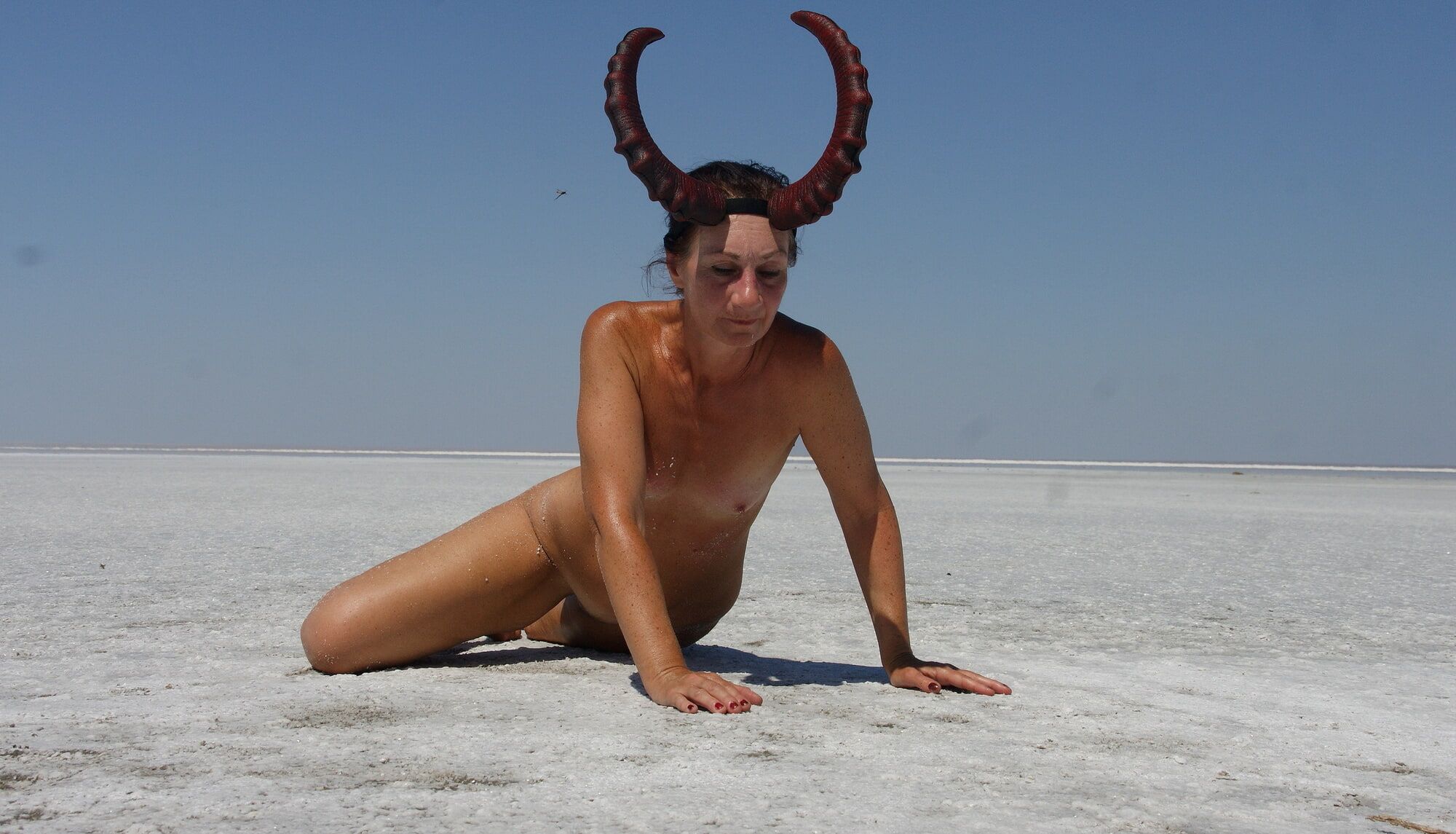 Standing on laps naked on the salt of the salt lake Elton #6