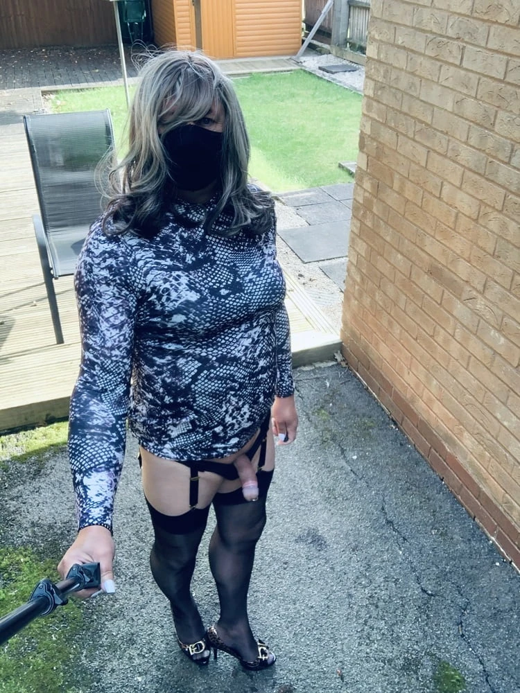 Kelly in snake skin pattern dress and black stockings  #28